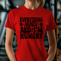 Load image into Gallery viewer, Everything Hurts and I&#39;m Hungry Women&#39;s T-shirt
